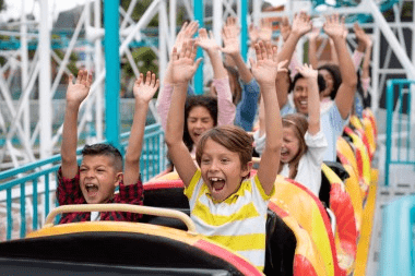 children on roller coaster