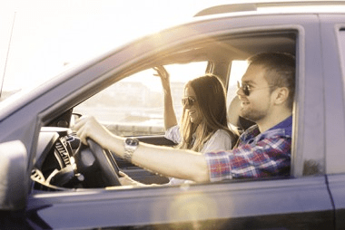 couple driving in car