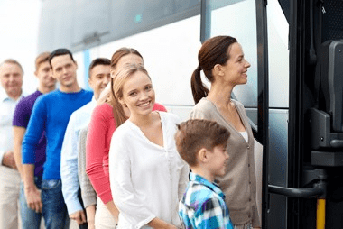 people boarding bus